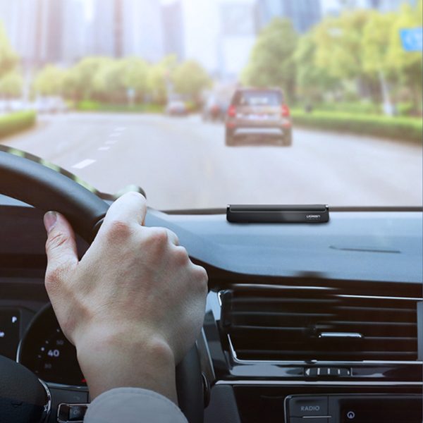 Automašīnas autostāvvieta autovadītāja tālruņa numuram - melns