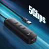 Hub USB -A rumbas porta draiveris - 4x USB 3.2 Gen 1 melns
