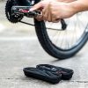 Velosipēdu soma instrumentiem, kas piestiprināti 0,65L ūdens pudeles rokturī - melns
