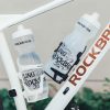 Polikarbonāta velosipēdu turētājs pudeles pudelei 51-73 mm - balts