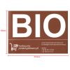 Bio uzlīme uz groza dumpkin kausa konteinera bio -pakešu pārtikas atkritumiem