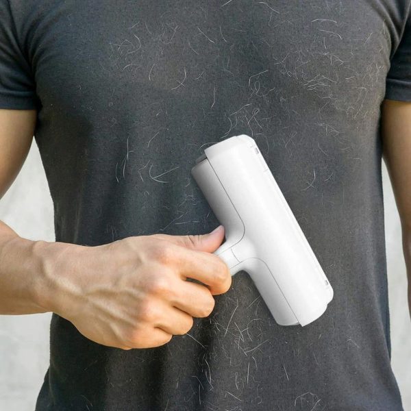 Rullīšu birste suņu un kaķu spalvu noņemšanai no drēbēm, mīkstajām mēbelēm un paklājiem