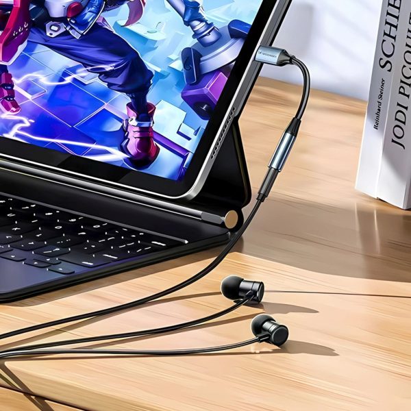 1031165-10-adapter-przejsciowka-usb-c-mini-jack-wozinsky-hurtownia-dropshipping-1.jpg USB-C uz 3,5 mm mini ligzdas adapteris — melns