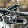 2-vienā velosipēda stiprinājums uz stūres datoram/navigatoram un kamerai/apgaismojumam - melns