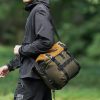 Ūdensizturīga velosipēda stūres soma 13,5–24 l – zaļa-oranža