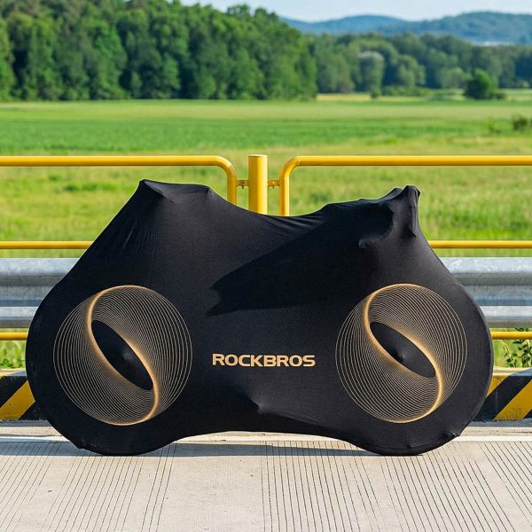 1035313-9-pokrowiec-elastyczny-na-rowery-gorskie-gravelowe-rockbros-hurtownia-dropshipping.jpg Elastīgs pārvalks 24–29 collu elektriskajiem grants kalnu velosipēdiem un 700C šosejas velosipēdiem — melns